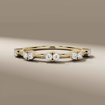 double stone round diamond band in yellow gold half eternity style
