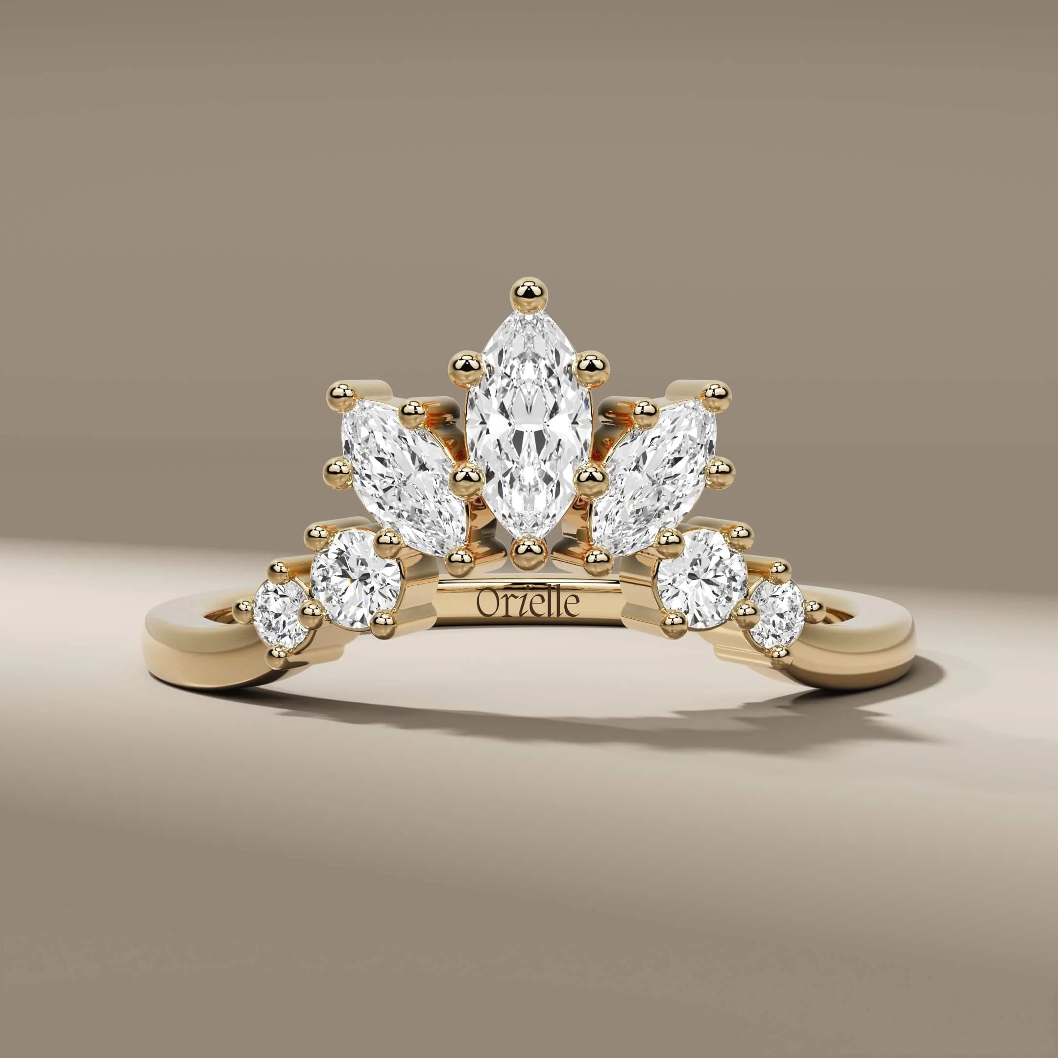 Tiara wedding band with marquise and round diamonds in yellow gold
