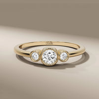 Round Cut Bezel Set Three Stone Wedding band