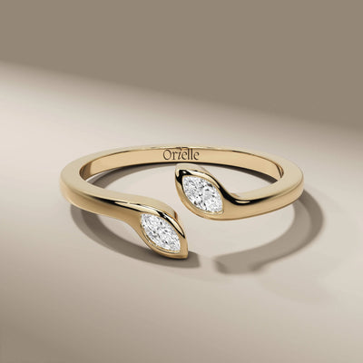 open band wedding ring featuring marquise cut lab grown diamonds
