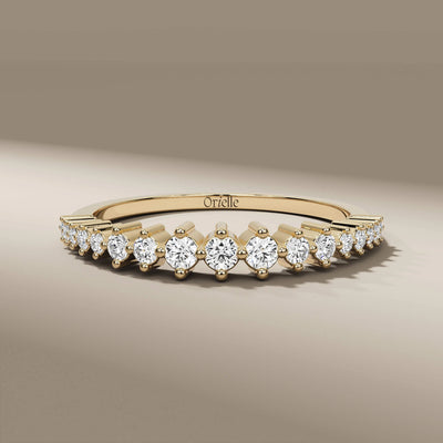 round diamond shared prong yellow gold half eternity wedding band
