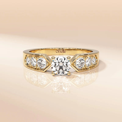 Vintage inspired side stone ring crafted in yellow gold
