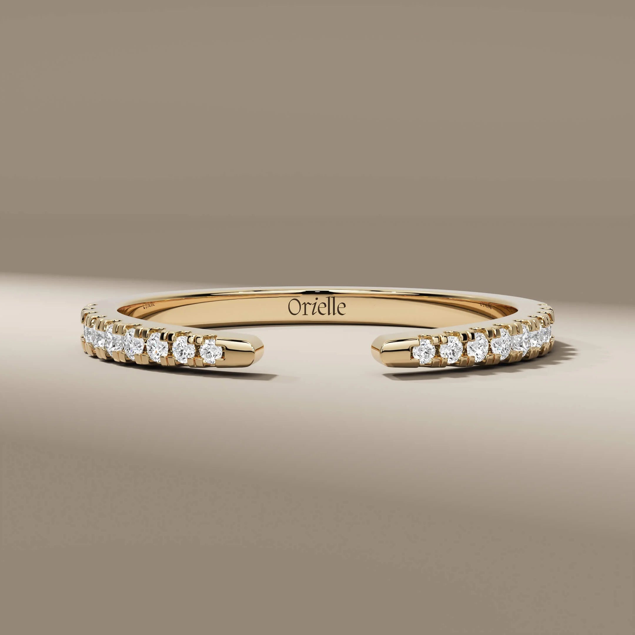 Open gap wedding band crafted in polished yellow gold
