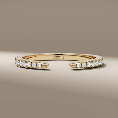 Open gap wedding band crafted in polished yellow gold
