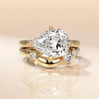 Solitaire Curved Style Pear Cut Engagement Ring