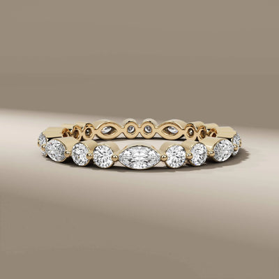 Marquise cut wedding band with round diamonds in full eternity style
