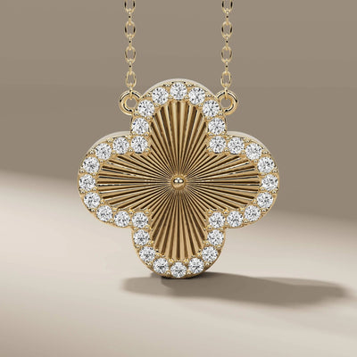 Round diamond pendant necklace in yellow gold clover design
