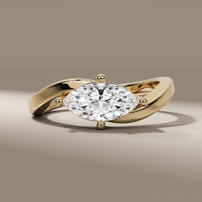 east west marquise ring in yellow gold 4 prong setting
