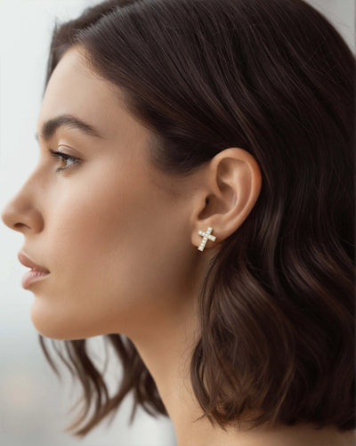 Handmade cross earrings with round moissanite and milgrain accents
