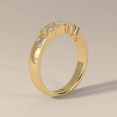 Round cut moissanite band with side stones in yellow gold
