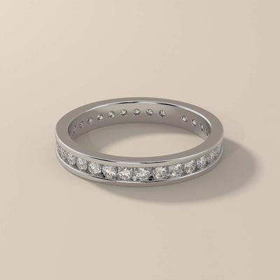 moissanite promise channel set wedding band in gold
