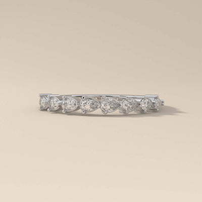 handcrafted pear shared prong moissanite wedding band
