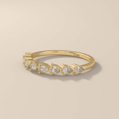 handmade pear shared prong half eternity wedding band
