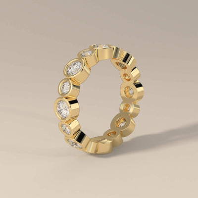 yellow gold bezel set moissanite promise band
