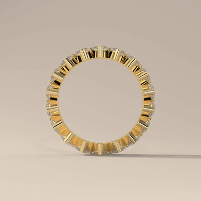 Yellow gold eternity wedding band with handmade detailing
