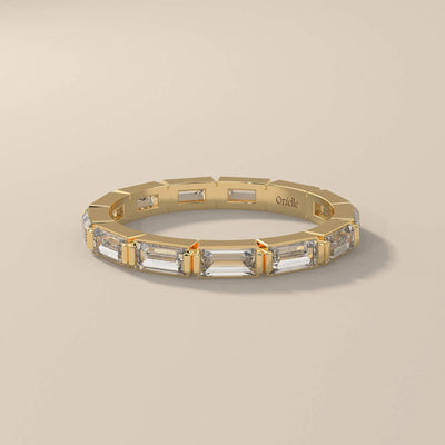 full eternity moissanite baguette band in gold

