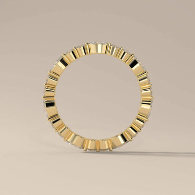Full eternity wedding band featuring marquise and round moissanite

