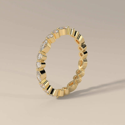 Shared prong eternity band with marquise cut and round moissanite
