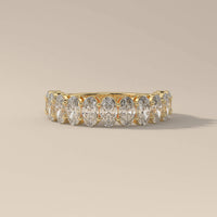 Half Eternity Oval Moissanite Wedding Band With Shared Prong