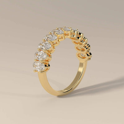 Oval moissanite wedding band crafted in shared prong half-eternity
