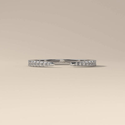 elegant round cut wedding band crafted in yellow gold
