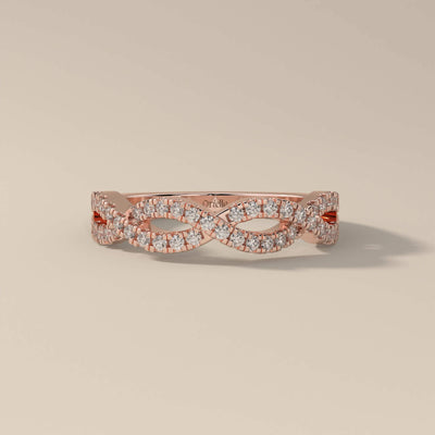 handcrafted infinity style twisted round moissanite band
