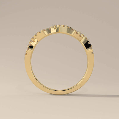 designer twisted wedding band with prong set moissanite
