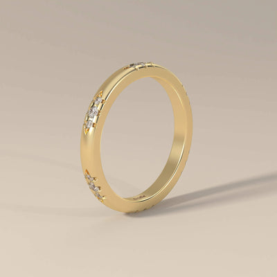Designer round cut band with unique setting in yellow gold
