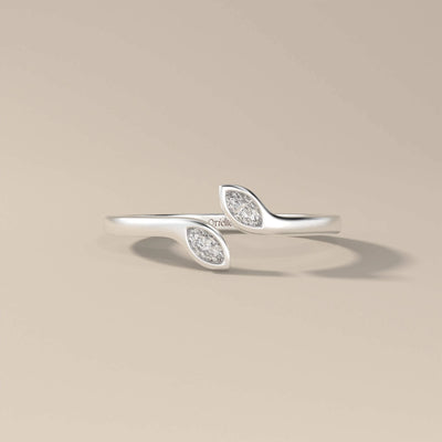Unique design marquise cut band in glowing yellow gold
