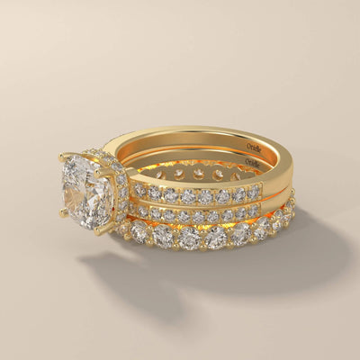 yellow gold bridal sets featuring cushion cut moissanite ring
