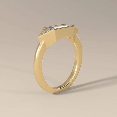 Bezel set engagement ring with trilliant side stones
