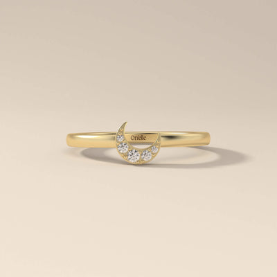 Half moon wedding band crafted in polished yellow gold
