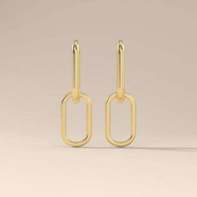 Dangle paperclip earrings crafted in yellow gold with hoop look
