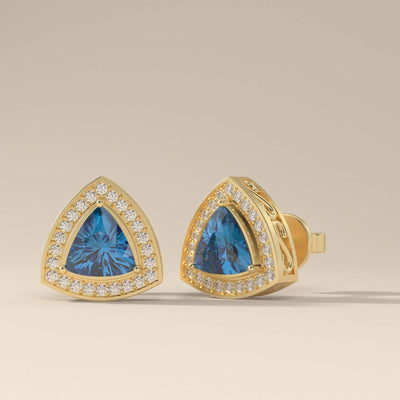 Prong set trillion moissanite earrings with filigree side work
