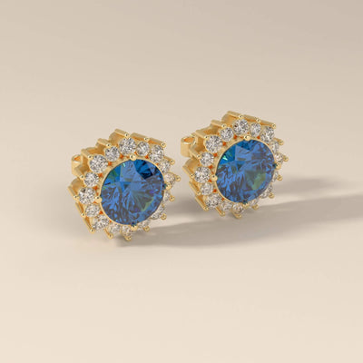 Designer blue sapphire halo earrings with unique gold style
