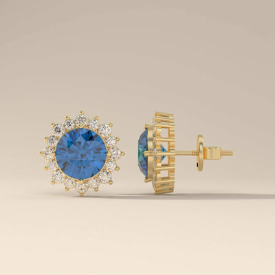 Unique design blue sapphire earrings in yellow gold setting
