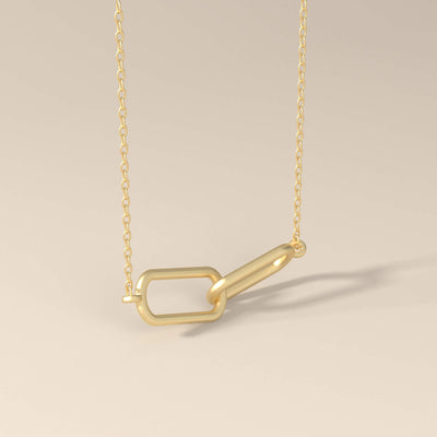 Minimalist gold link pendant on delicate chain
