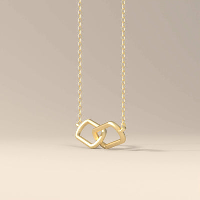 Handmade gold link necklace with simple design

