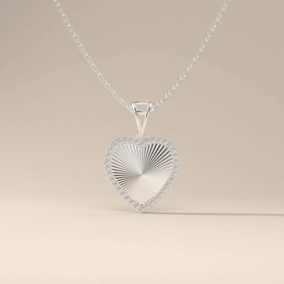 Unique heart necklace with round halo stones
