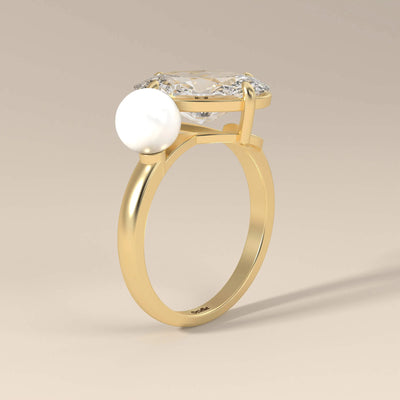 Yellow gold toi et moi ring with pearl and moissanite
