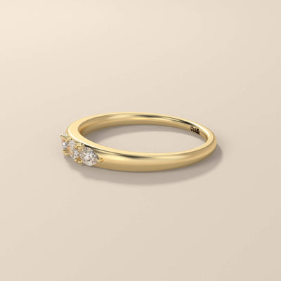 Handmade oval cut moissanite ring with a unique three stone design
