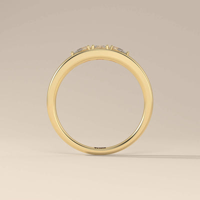 Yellow gold moissanite promise ring featuring an oval center stone
