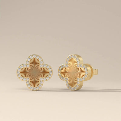 Gold clover stud earrings with round cut moissanite stones
