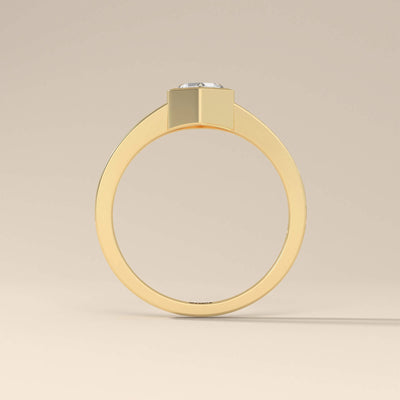 Handmade bezel set engagement ring with unique craftsmanship

