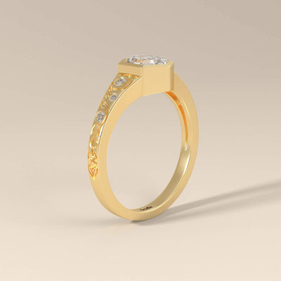 Yellow gold engagement ring featuring round side stones
