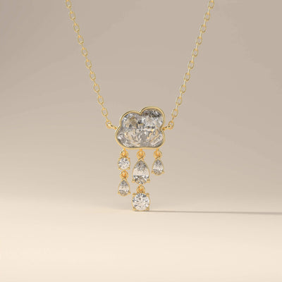 Cloud moissanite pendant with pear and round cut stones
