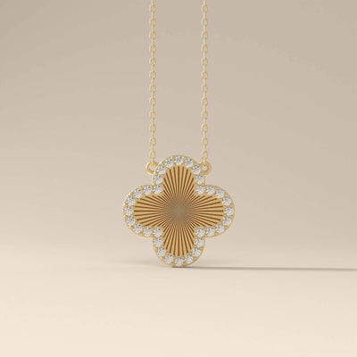Clover pendant necklace with round diamond design
