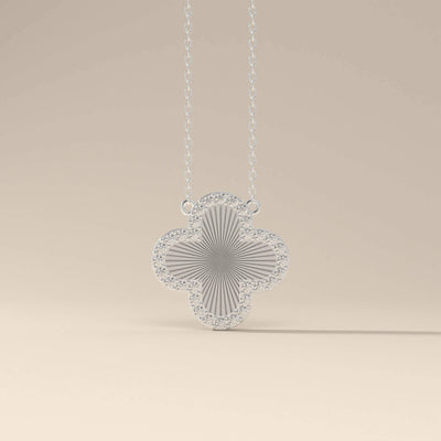 Gold designer clover necklace with round diamond
