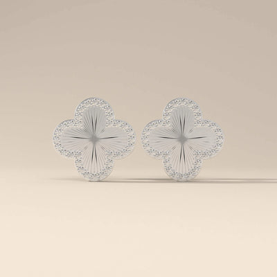 Round cut moissanite clover earrings in gold stud design
