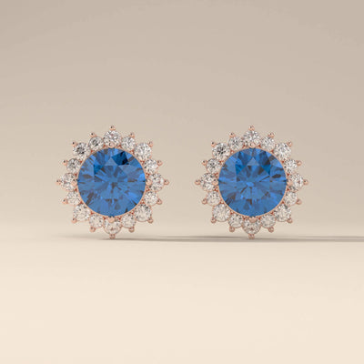 Elegant blue sapphire studs with round moissanite halo
